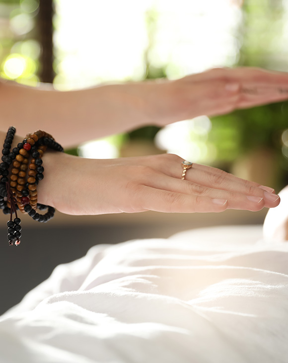 massage therapy session promoting relaxation and well-being with gentle touch and healing energy for six areas of focus