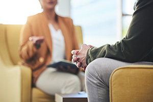 two people having a conversation in a cozy setting focusing on communication and emotional support while discussing thirteen key topics
